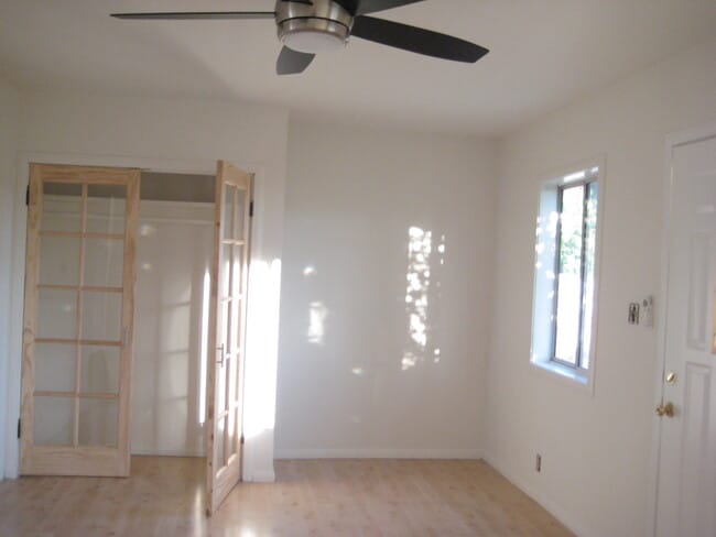 living room with storage closet - 1579 Cerro Gordo St