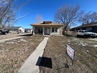 Building Photo - Spacious-Charming-Two Plus Bedrooms-Sunny Windows-Fenced Yard-Pet Family Members Welcome!