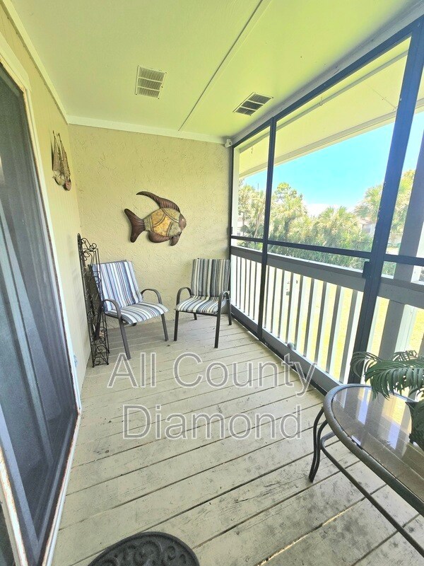 Building Photo - 6903 N Lagoon Dr