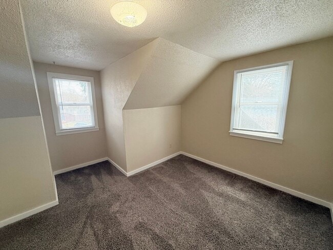 Building Photo - 5BR Home with Fenced Backyard, Firepit & Bonus Space