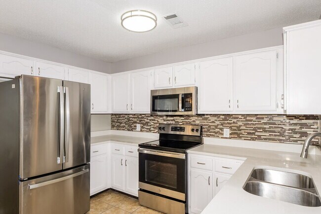 Building Photo - 2960 Woodland Ash Cove