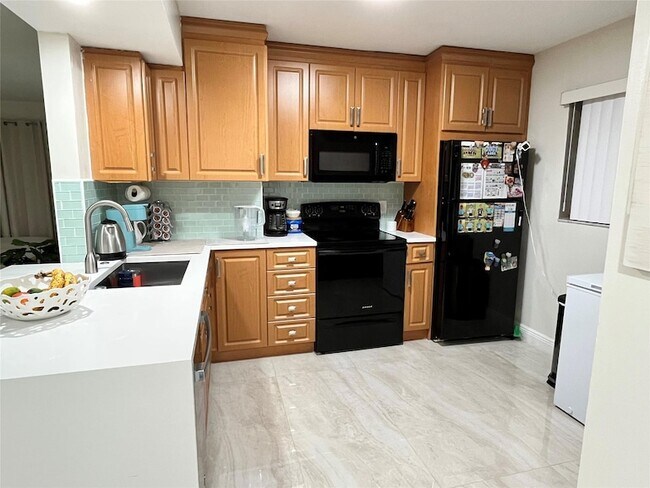 Building Photo - 12069 Royal Palm Blvd
