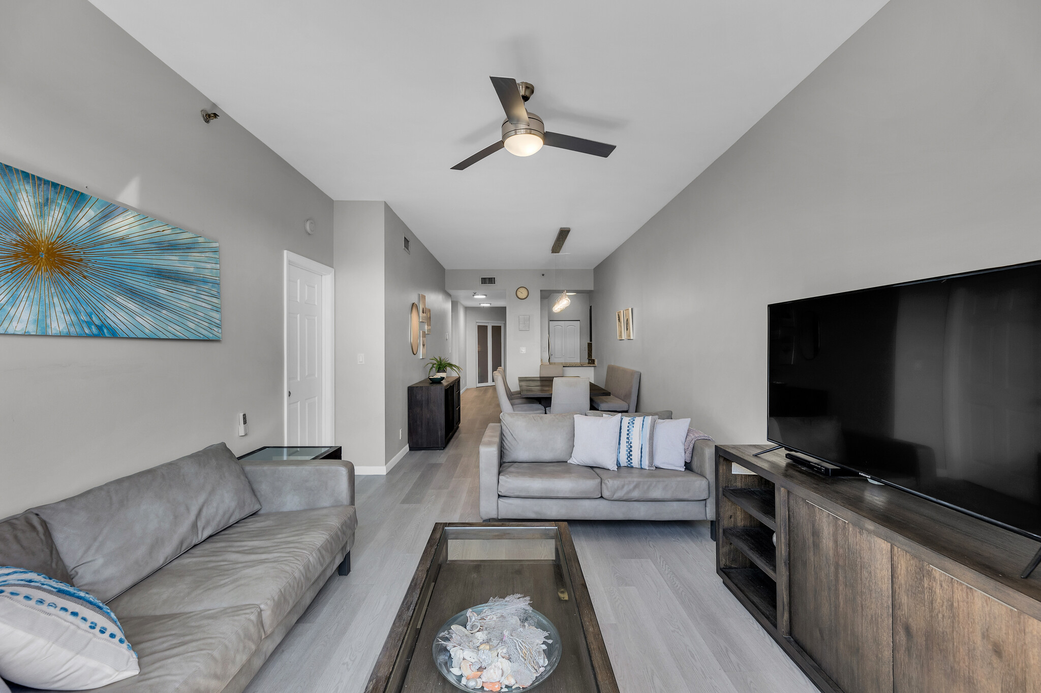 View of living room/ dining area. Main bedroom on the left - 8816 Collins Ave