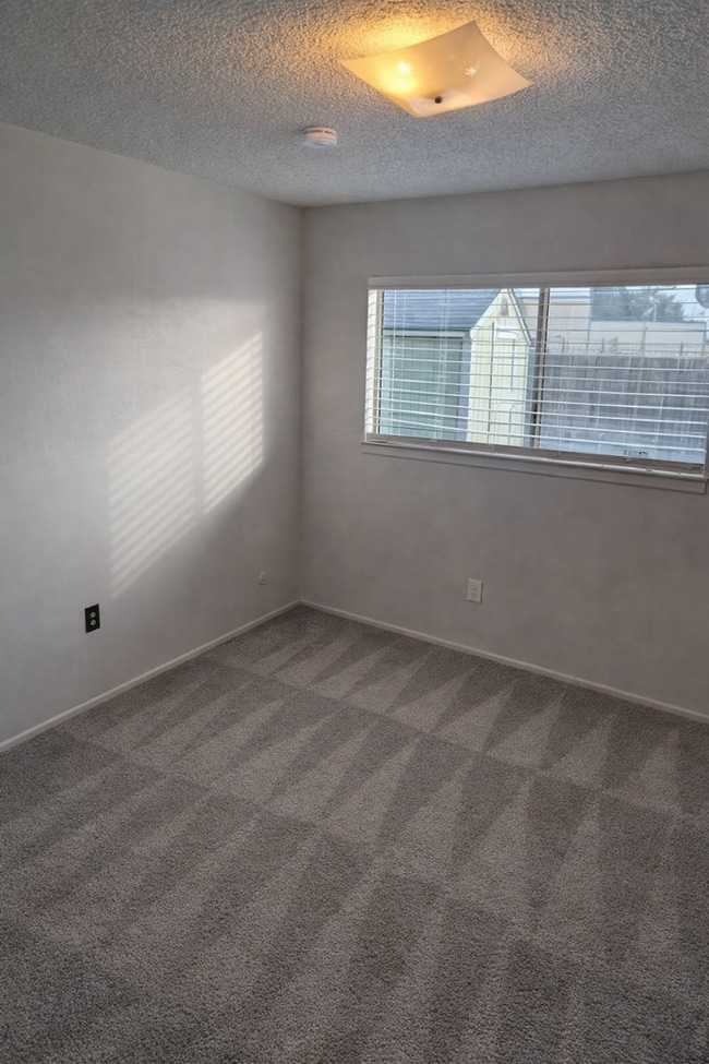 Building Photo - Move-In Ready 3-Bedroom Home with Solar, Backup Batteries, Covered Patio & Large Yard