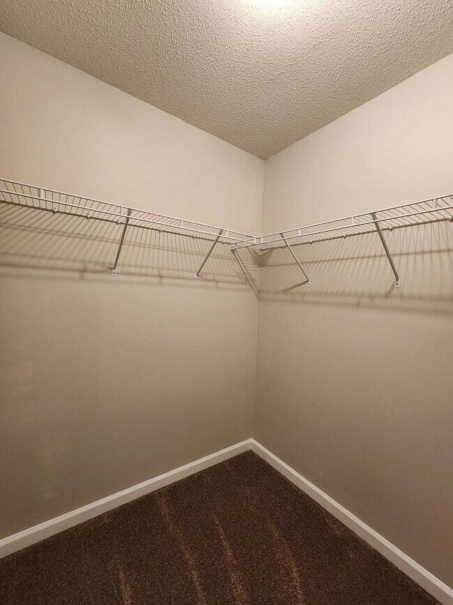 Building Photo - Beautiful 3 bed 2 1/2 bath townhome in a gated community with a pool. Showings Coming Soon!!!
