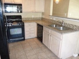 Kitchen with granite counter tops - 8415 Pebble Creek Way