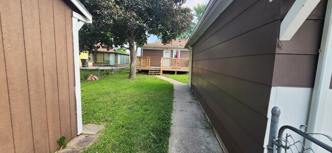 Building Photo - Beautiful 4 Bedroom, 2 Bathroom Home with garage, shed, deck, and fenced yard!