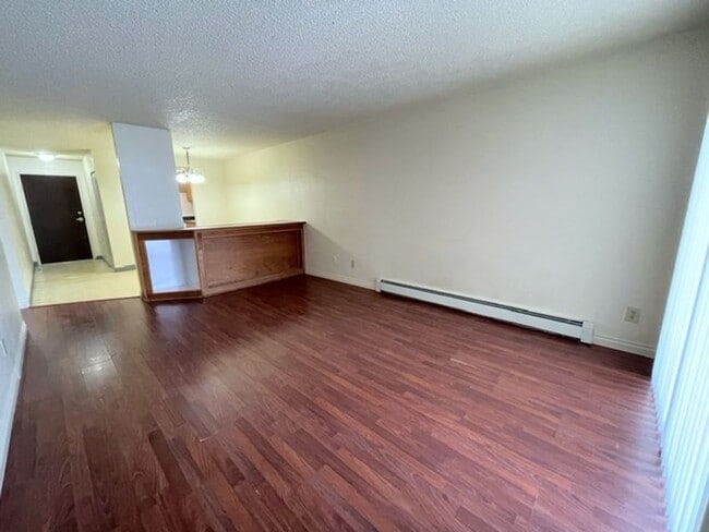Building Photo - East Anchorage Condo with Laminate Floorin...