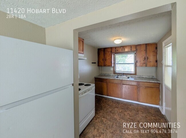 Building Photo - 11420 Hobart Blvd