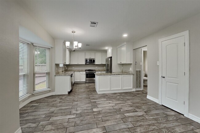 Building Photo - 2603 Hidden Garden Dr