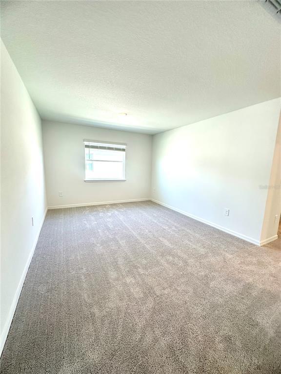 Building Photo - 8795 Coqui Song Ln