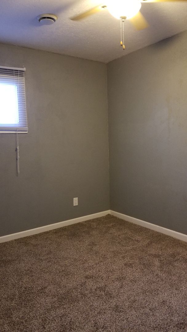 Building Photo - NE 3 bedroom updated with appliances and garage