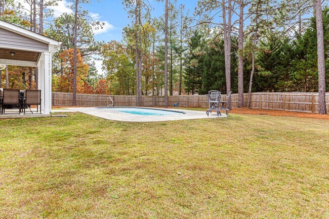 Building Photo - Southern Pines Gem! Pool and fenced backyard!
