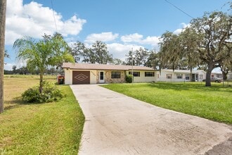 Building Photo - 4704 Queen Palm Dr