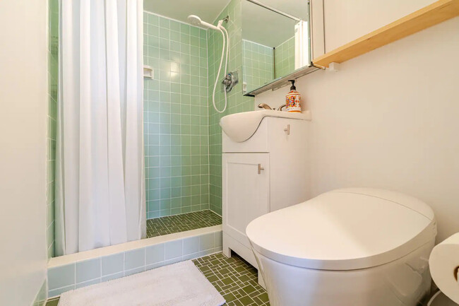 New bidet toilet, lovingly restored original tile - 445 Kaiolu St