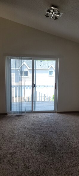 lower family room with walkout patio - 8705 Glasgow Ln