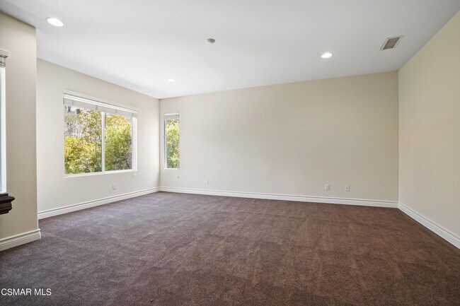 Building Photo - 6077 Mandeville Pl