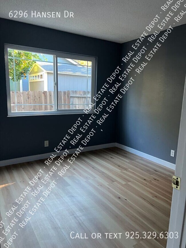 Building Photo - 6296 Hansen Dr