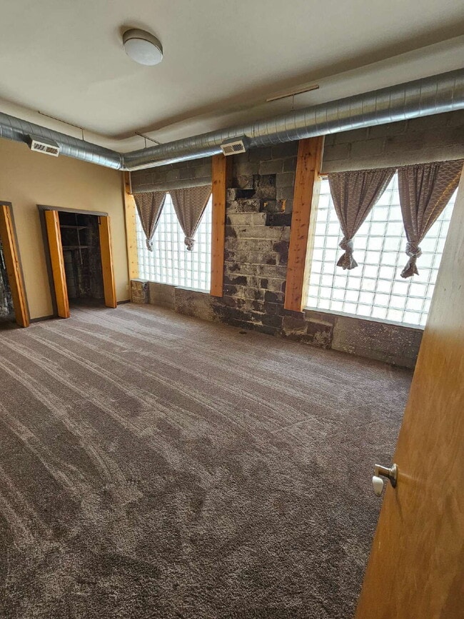 Building Photo - Unique 2 Bedroom Downtown Mount Clemens Loft with Updated Kitchen, Spacious Living Room, Balcony ...