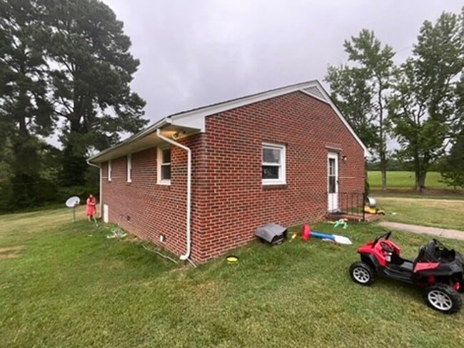 Building Photo - Charming Brick Rancher Retreat – Available...