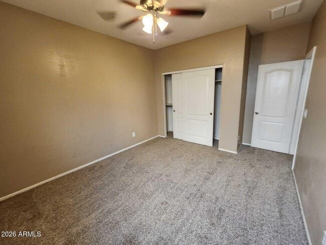 Building Photo - 7643 W Charter Oak Rd