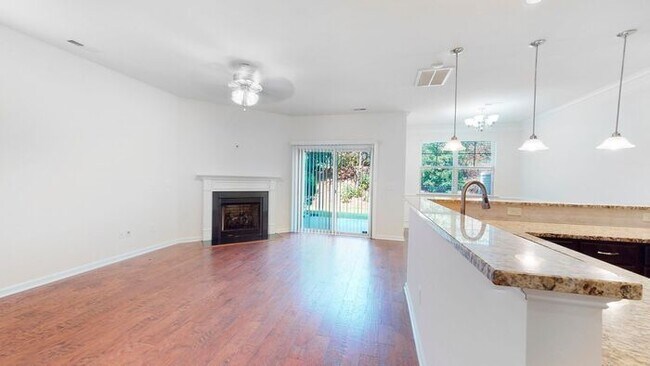 Building Photo - Inviting End Townhome with Loft, Granite Kitchen & 2-Car Garage , Near RTP, RDU, I-40 & I-540