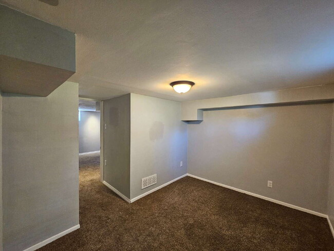 Building Photo - Charming 2-Bedroom Home with Spacious Back...