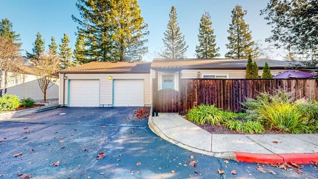 Building Photo - Cozy 1 bedroom 1 bath end unit condo with 1 car garage and private patio located next to Peterson...