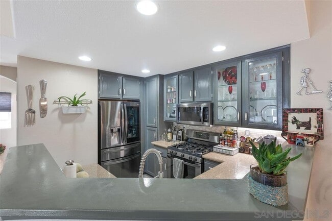 Building Photo - MOVE-IN SPECIAL $500 OFF! Otay Ranch - Gorgeous 2 Bed/2 Bath Condo with Garage