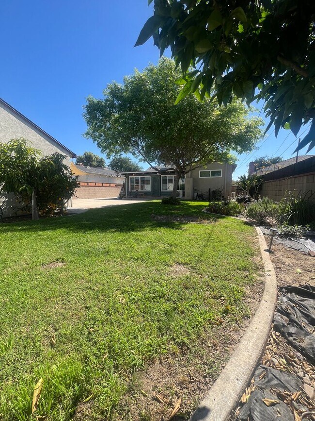 Building Photo - Home with a Cabin Style Family room and backyard Oasis