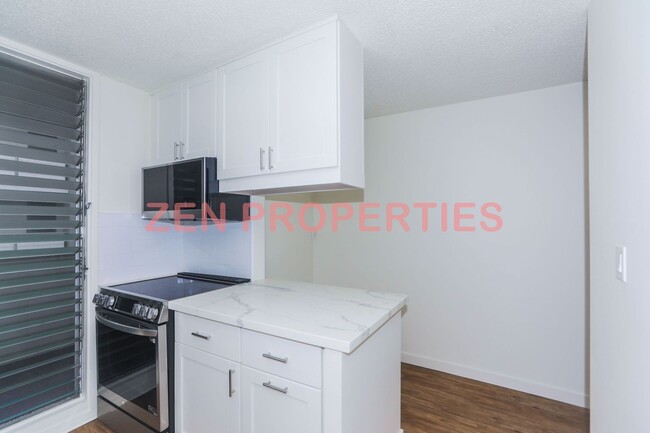 Building Photo - a 2 bedroom, 1.5 bath condo for rent at Ka...