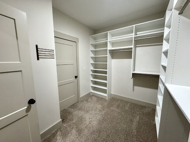 Building Photo - Need Space?  How about 5 bedrooms, 2.5 baths + an extra bonus area upstairs so that the kids can ...