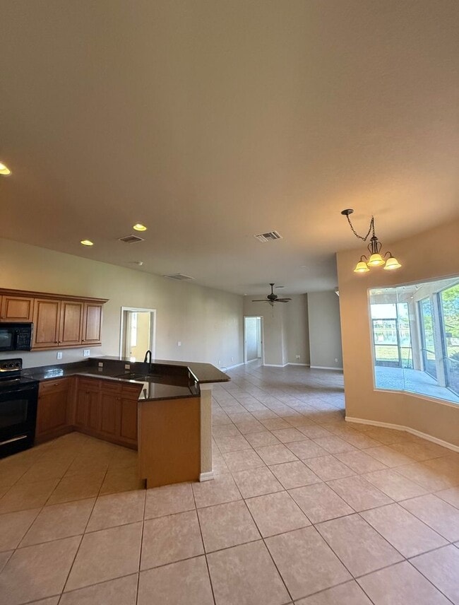 Building Photo - 4 Bedroom, 3 Bath Lakefront Home with 3-Ca...