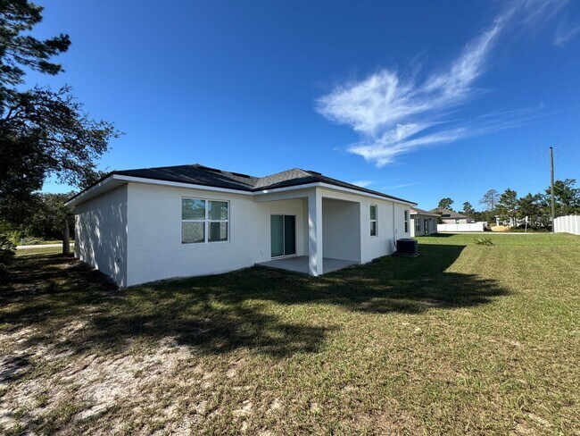 Building Photo - $500 OFF OF A MONTH OF RENT! Beautiful 4BD/2BA Home in Poinciana – No HOA Approval Needed! Pets W...