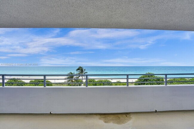 Building Photo - 5555 Collins Ave