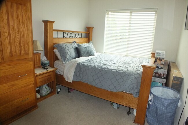 Building Photo - Spacious End-Unit 3-Bedroom Townhouse with 2-Car Garage & Central AC