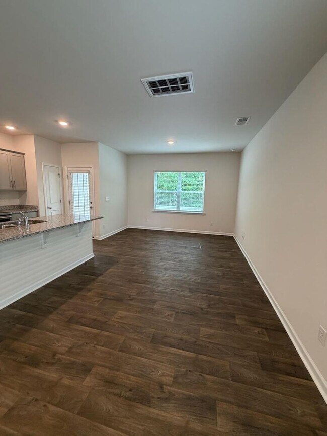 Building Photo - Brand new 3 bedroom townhome available for immediate move in!