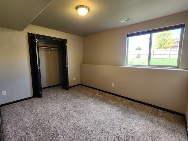 Building Photo - ** SPECIAL MOVE-IN OFFER ** 4 Bedroom, 3 B...