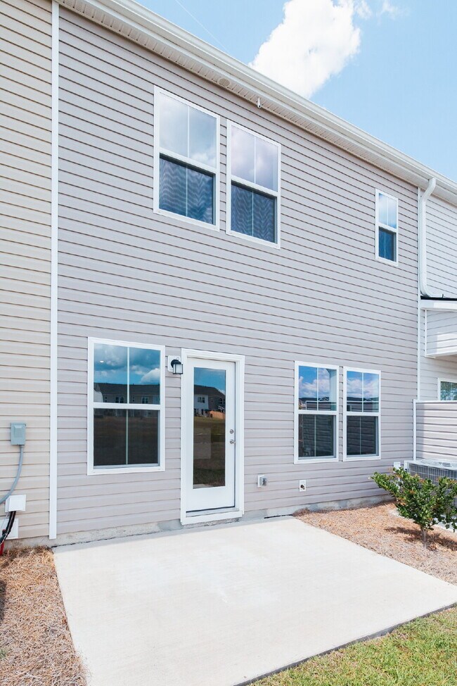 Building Photo - Brand-new 3 bedroom, 2.5 Bath Townhome with pond view