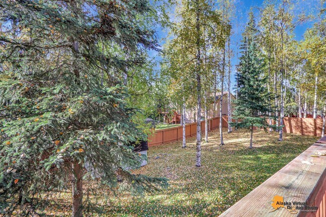 Building Photo - Eagle River Home w/ Fenced Yard, Sunroom, and Garage!