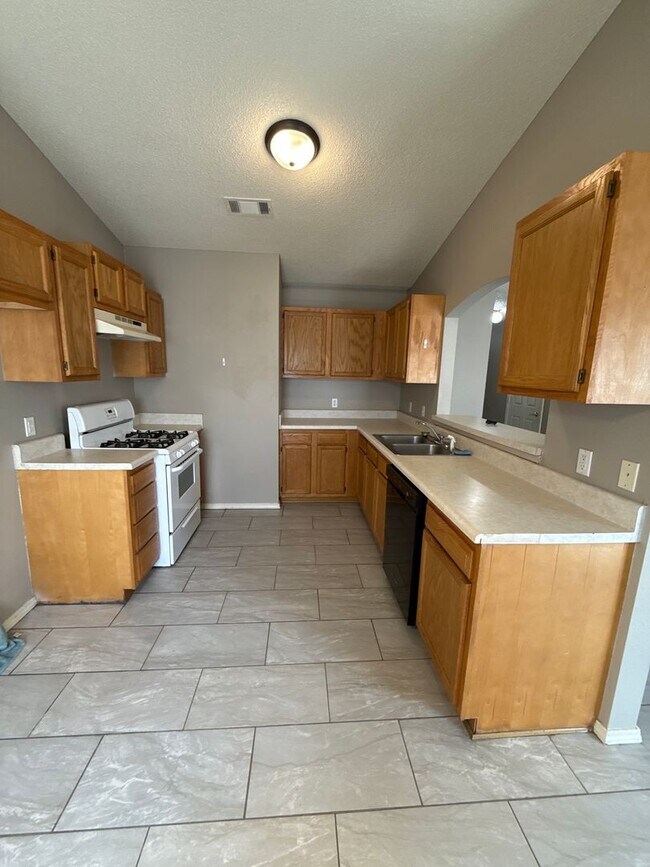 Building Photo - 3 bed, 2 bath, 2 car garage House, yard care included