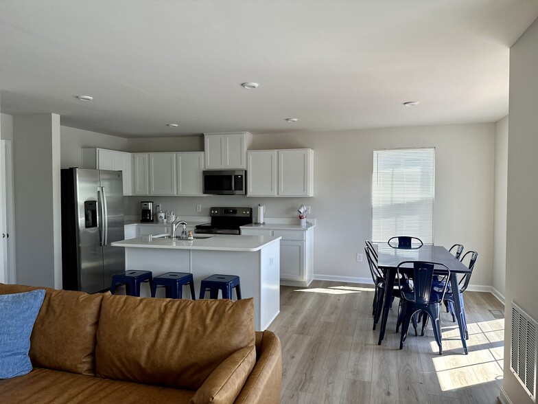Main floor living kitchen + dining - 149 Thicket Dr