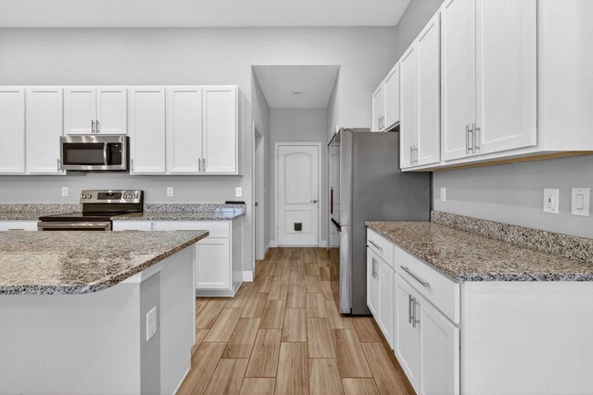 Building Photo - Modern 4-Bedroom Rental with Screened Patio & 2-Car Garage