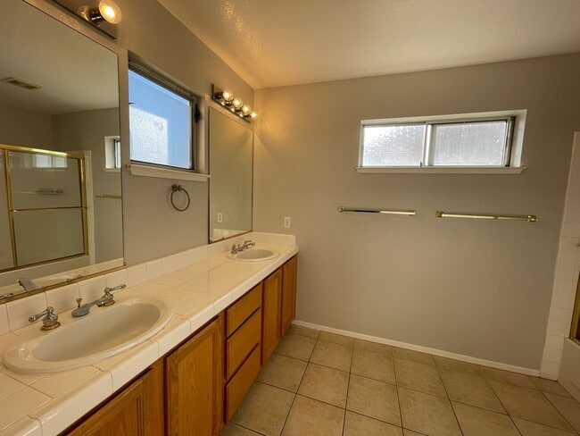 Building Photo - Beautiful Town Home Coming Soon! Great Location! Pets Allowed!