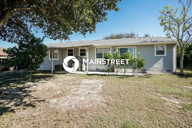 Building Photo - 4 Bedroom Pet-Friendly Home in Lehigh Acres, FL with Main Street Renewal