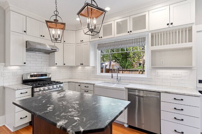 Building Photo - Timeless Charm Meets Modern Luxury in the ...