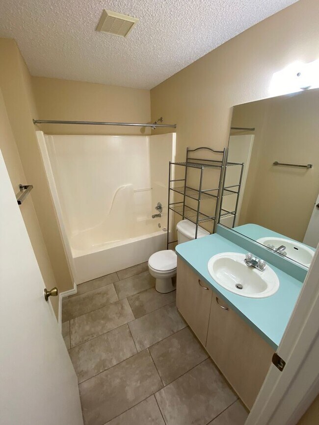 Building Photo - Charming Just Renovated Unfurnished ANNUAL LEASE - 2 Bedroom 2 Bath Patio Villa - Located In The ...