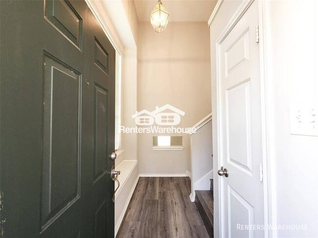 Building Photo - This gem of a townhome is nestled in the w...