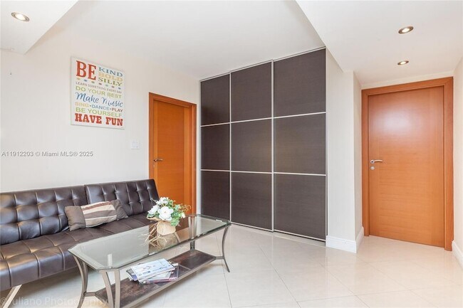 Building Photo - 19380 Collins Ave