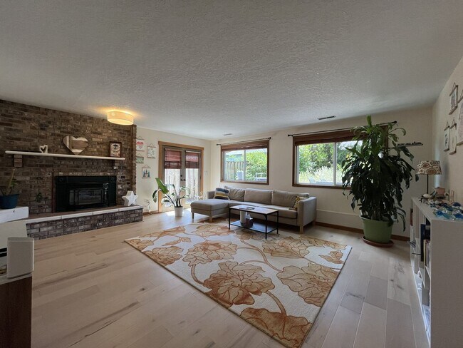 Building Photo - Bright and Open 4 Bedroom Cedar Mill Home with Vaulted Ceilings, Skylights & Multiple Living Areas